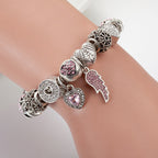 Silver Heart Charm Bracelet with Pink Diamonds for Women